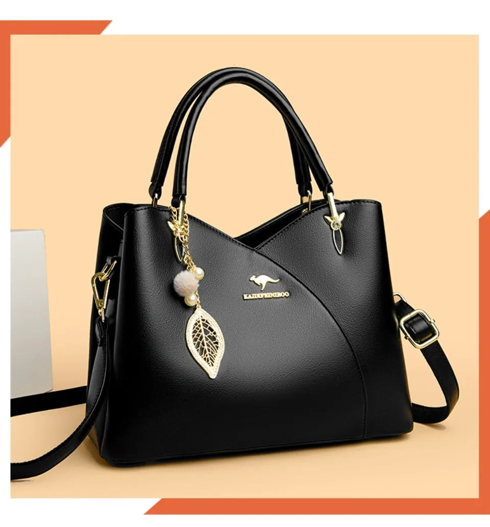 felina™ – geantă de umăr neagră cu pandantive elegante