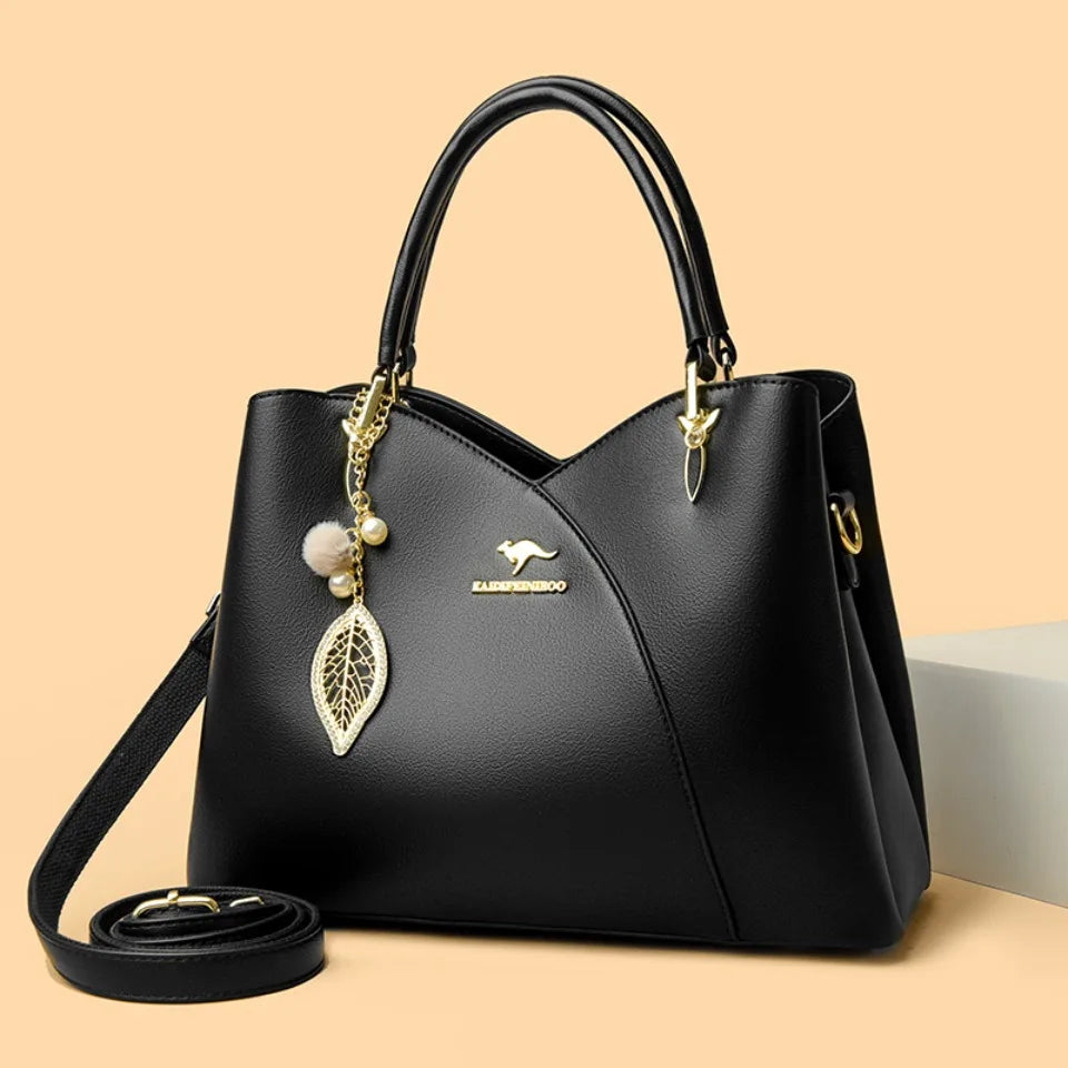 felina™ – geantă de umăr neagră cu pandantive elegante